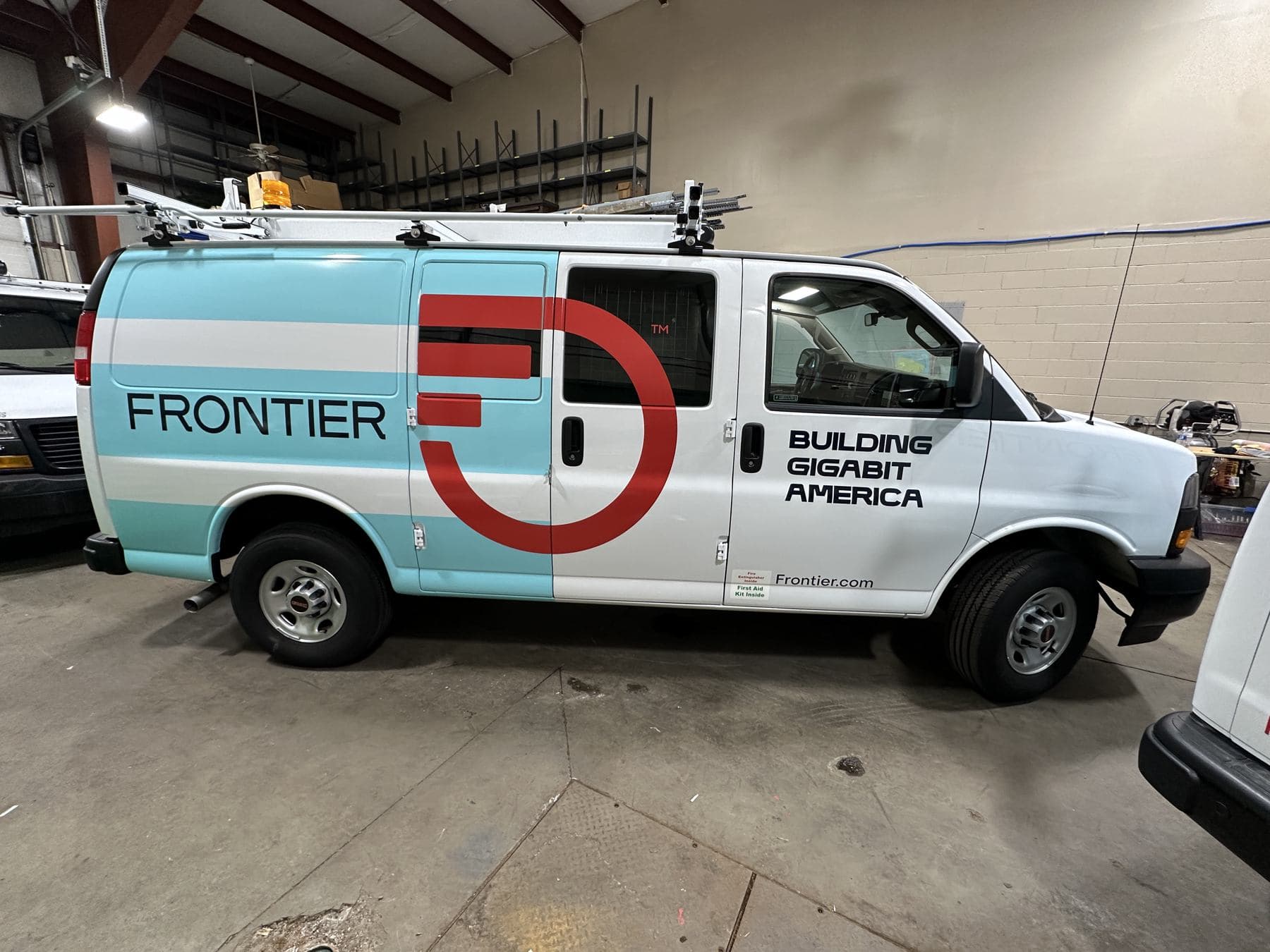 Frontier branded vehicle photographed in the production workshop