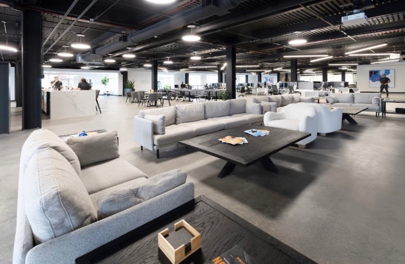 FTS headquarters open office and lounge, a real branded workplace environment